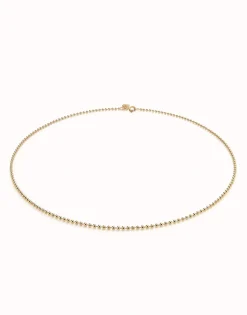 Cadena media con bolas bañada en oro 18k