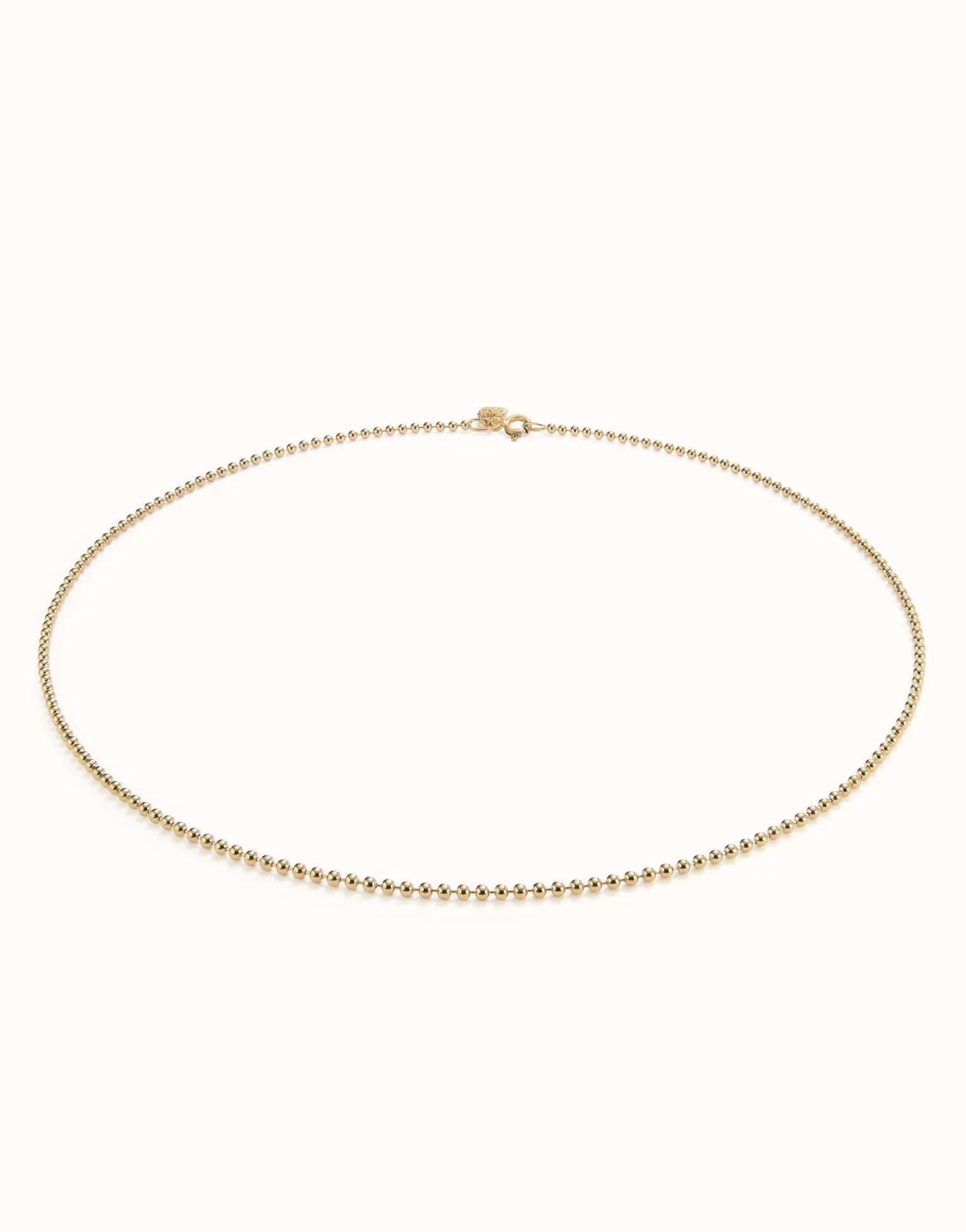 Cadena media con bolas bañada en oro 18k