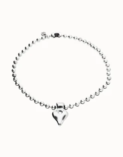 Collar con bolas bañado en plata de ley y detalle de corazón