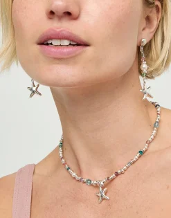 Collar corto bañado en plata con cristales y estrella de mar pequeña