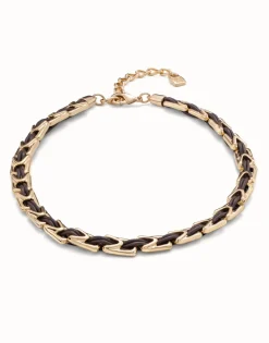 Collar corto de cuero y eslabones bañados en oro de 18k