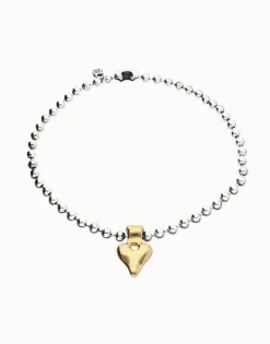 Collar de bolas bañada en plata con detalle de corazón en oro 18k