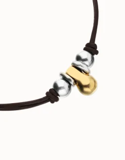 Collar de cuero con tres esferas bañadas en mix de plata y oro 18k