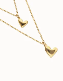 Collar doble bañado en oro 18k con dos corazones