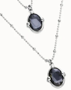 Collar doble bañado en plata con dos cristales facetados ovalados negros