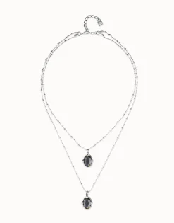 Collar doble bañado en plata con dos cristales facetados ovalados negros
