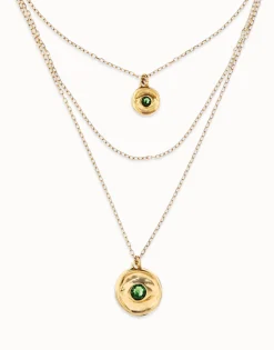 Collar triple bañado en oro 18k con charms de ojo y cristal facetado verde