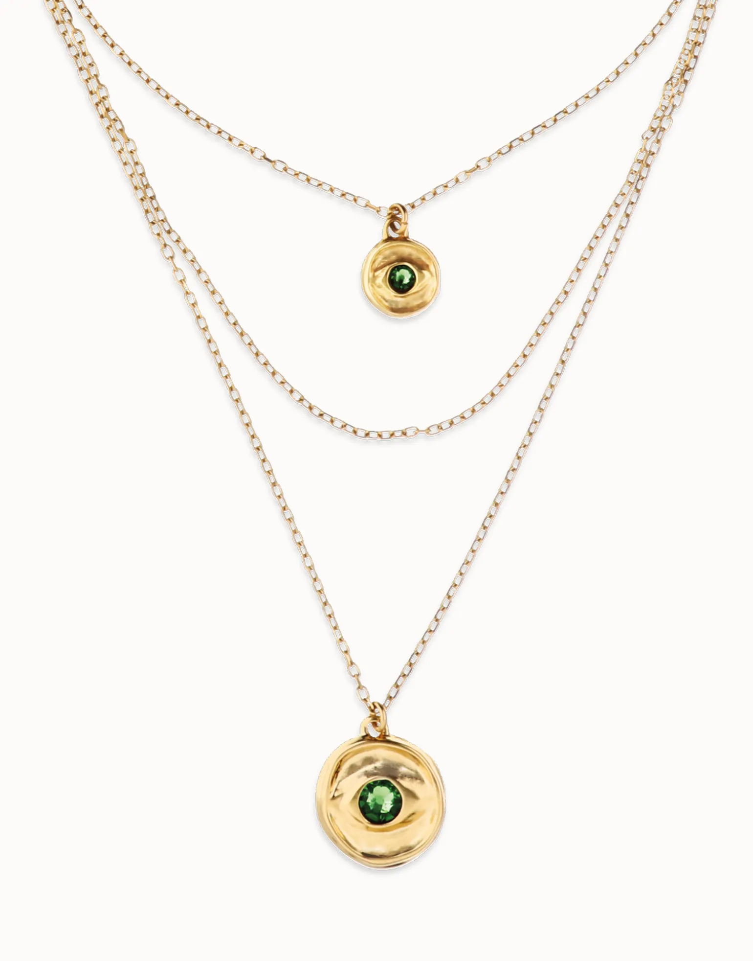 Collar triple bañado en oro 18k con charms de ojo y cristal facetado verde