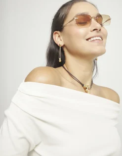 Pendientes bañados en oro 18k con cadena larga y esfera