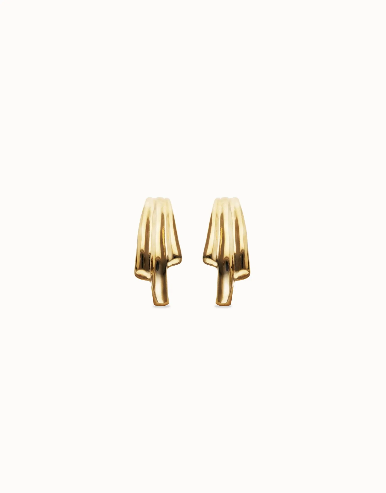 Pendientes con formas orgánicas alargadas bañados en oro 18k
