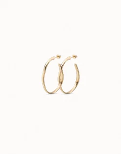 Pendientes de aro abierto bañados en oro de 18k