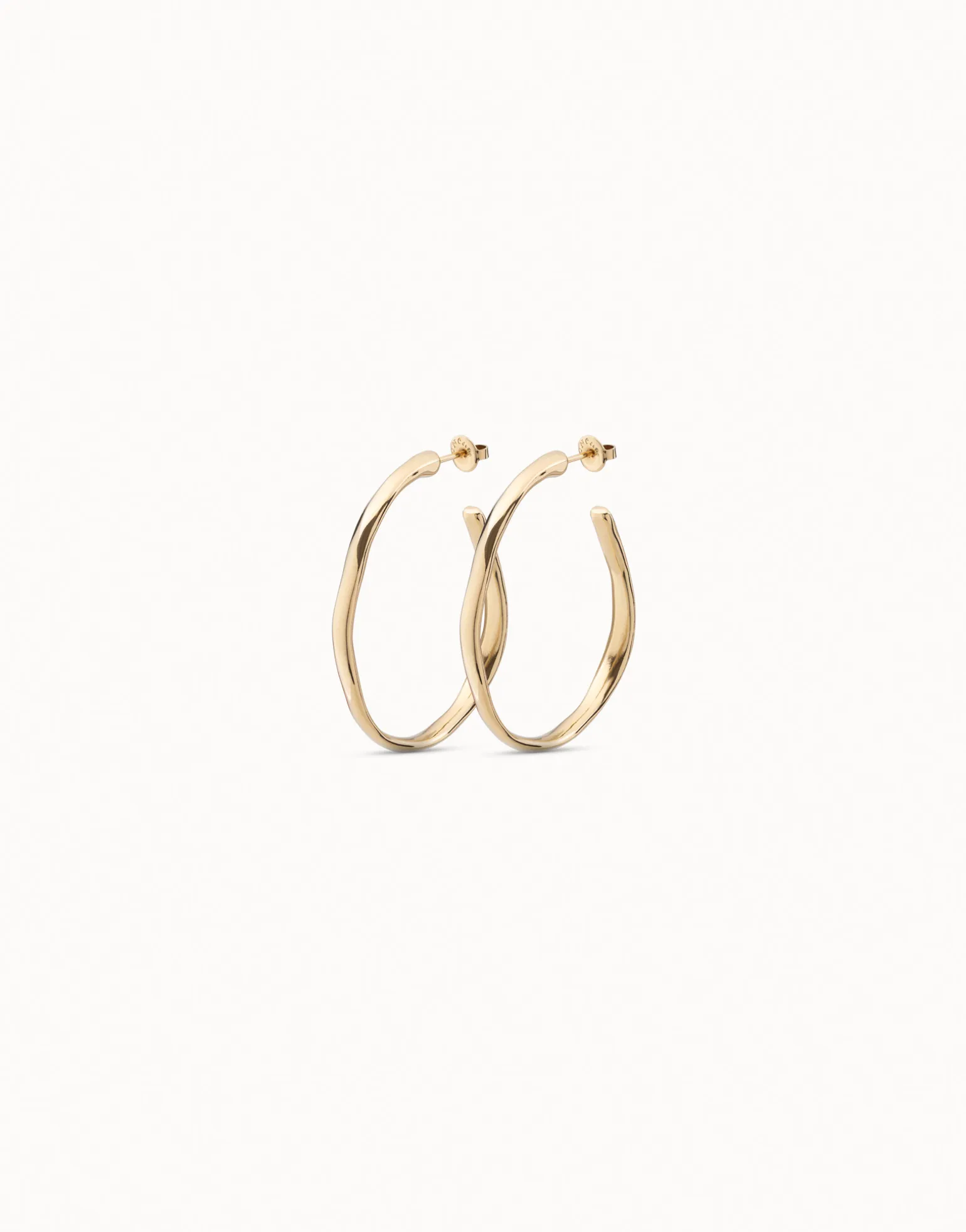 Pendientes de aro abierto bañados en oro de 18k