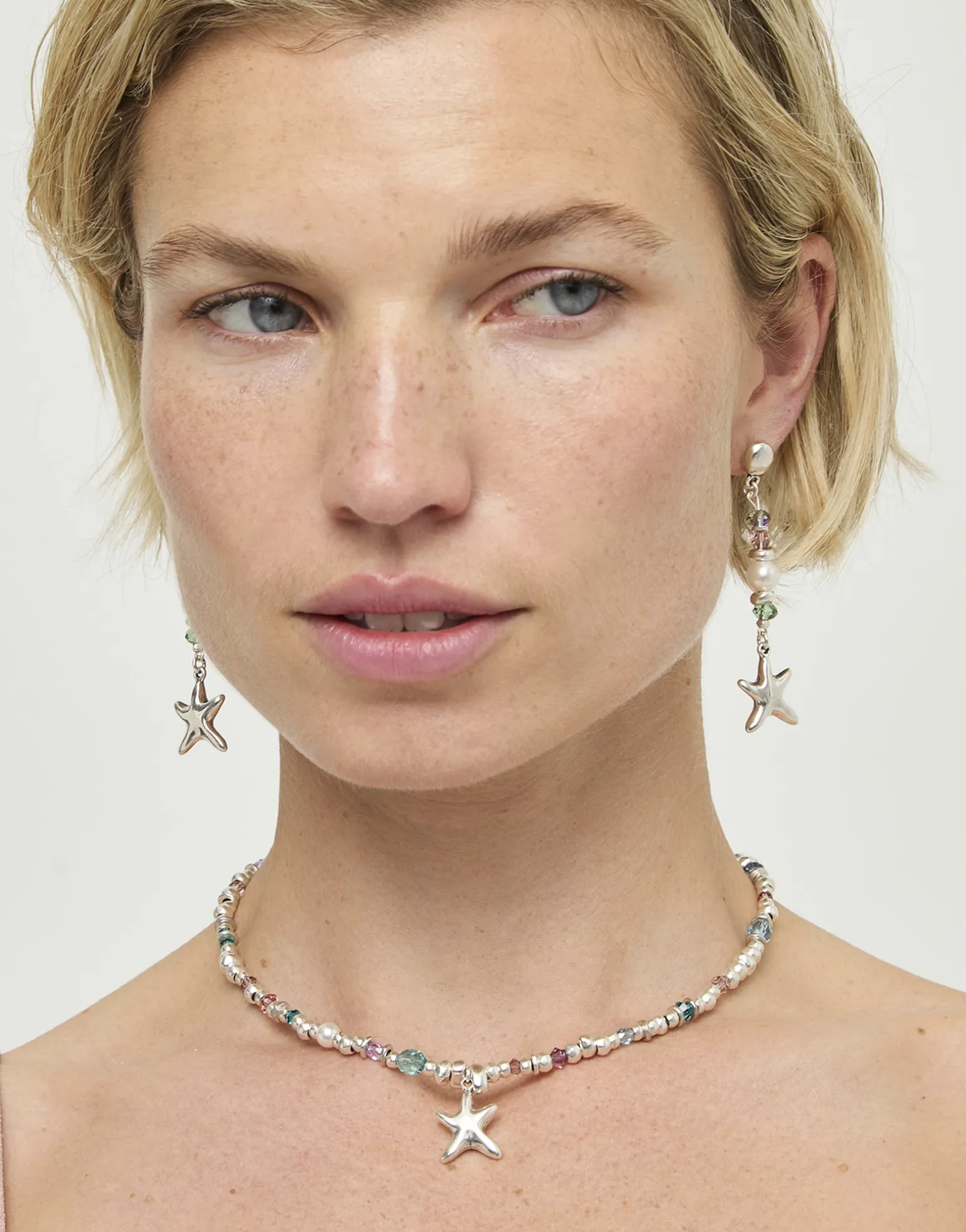 Pendientes largos con estrella de mar y perla