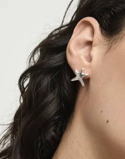 Pendientes pequeños bañados en plata estrellas de mar