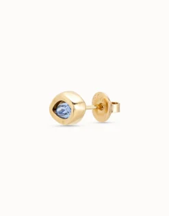 Piercing bañado en oro de 18k y un cristal azul