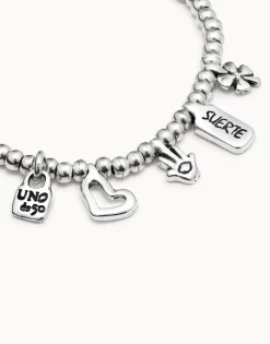 Pulsera bañada en plata de ley con charm corazón, trébol y mano