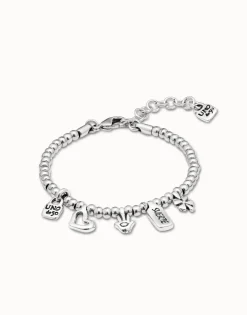Pulsera bañada en plata de ley con charm corazón, trébol y mano