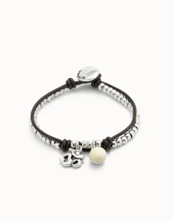 Pulsera bañadas en plata de ley con cuero y cristal de murano marfil