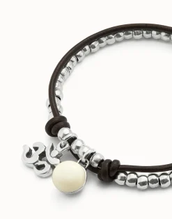 Pulsera bañadas en plata de ley con cuero y cristal de murano marfil