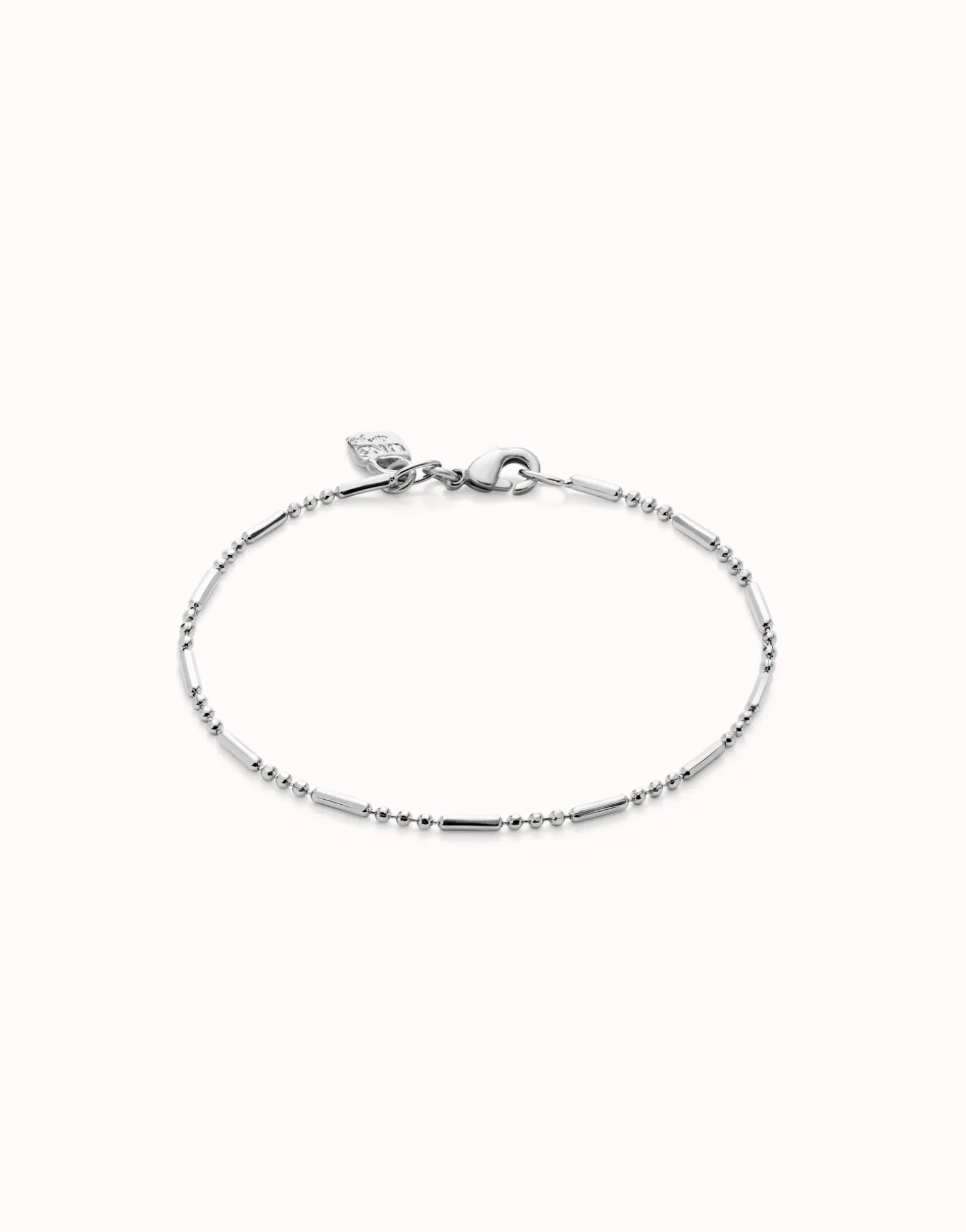 Pulsera con bolas y piezas alargadas bañada en plata de ley