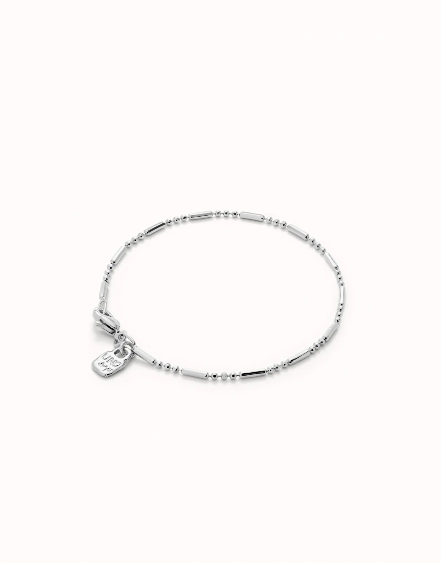 Pulsera con bolas y piezas alargadas bañada en plata de ley