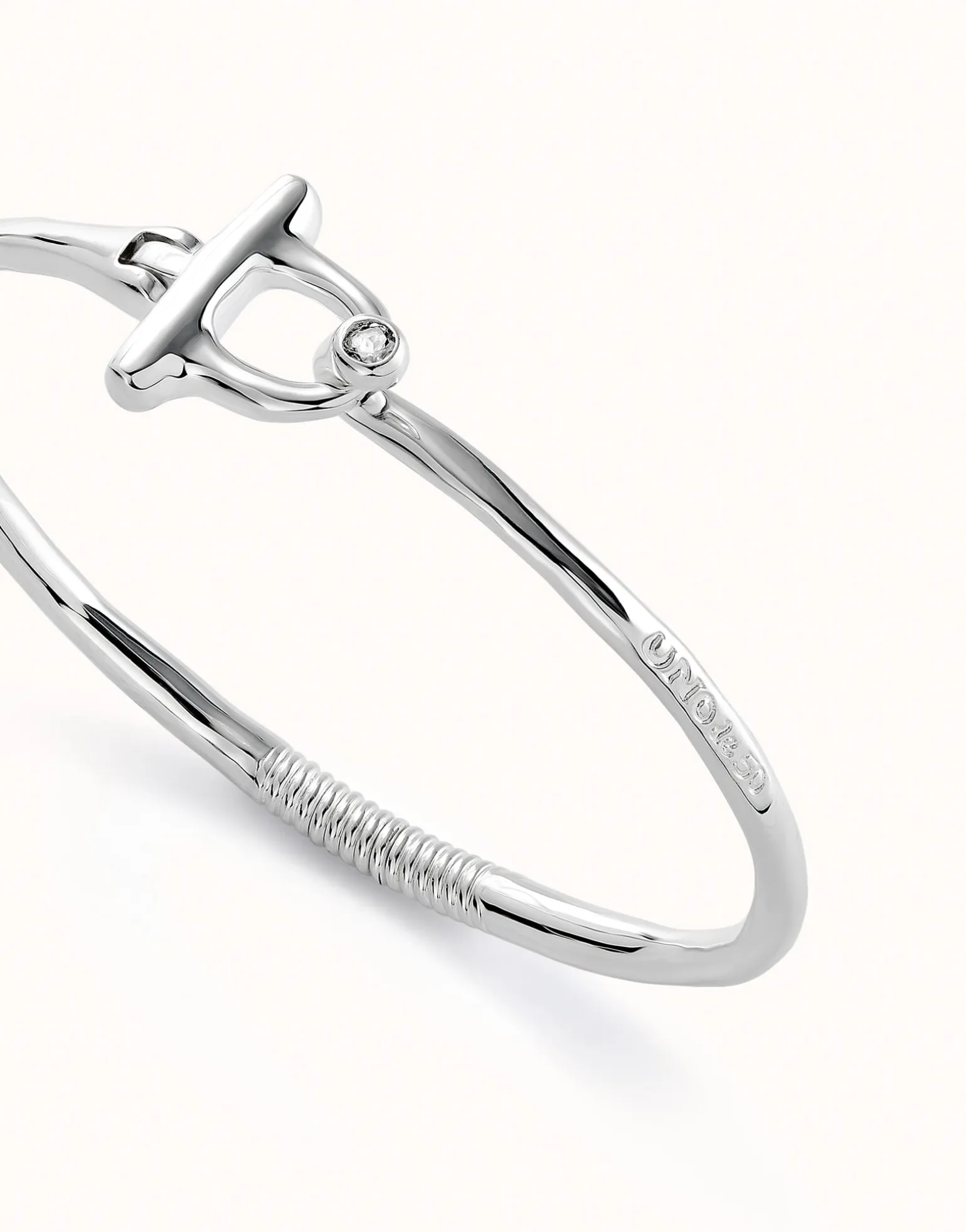 Pulsera con cierre frontal bañada en plata de ley con topacio blanco