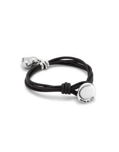 Pulsera con 4 tiras de cuero con cierre botón y charm de corazón bañado en plata de ley