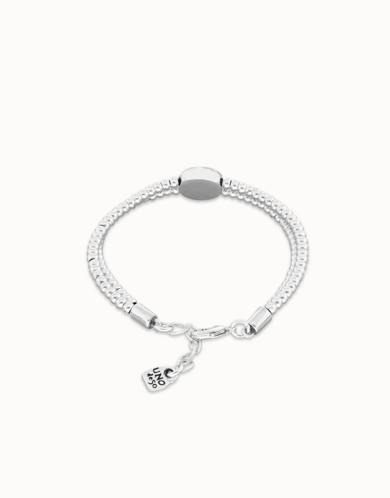 Pulsera de bolas doble bañada en plata de ley con detalle de ojo y cristal azul