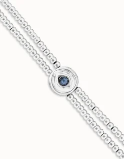 Pulsera de bolas doble bañada en plata de ley con detalle de ojo y cristal azul