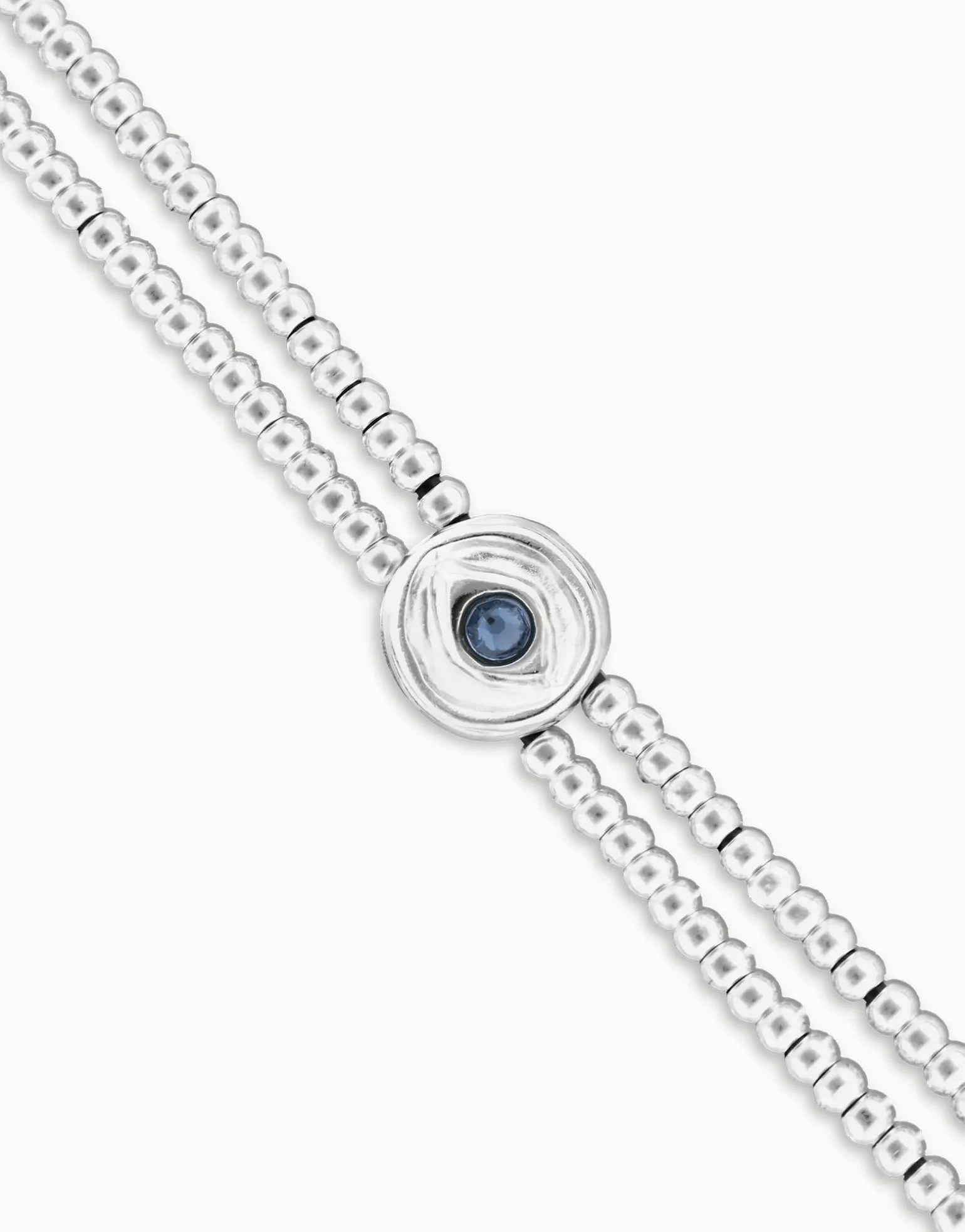 Pulsera de bolas doble bañada en plata de ley con detalle de ojo y cristal azul