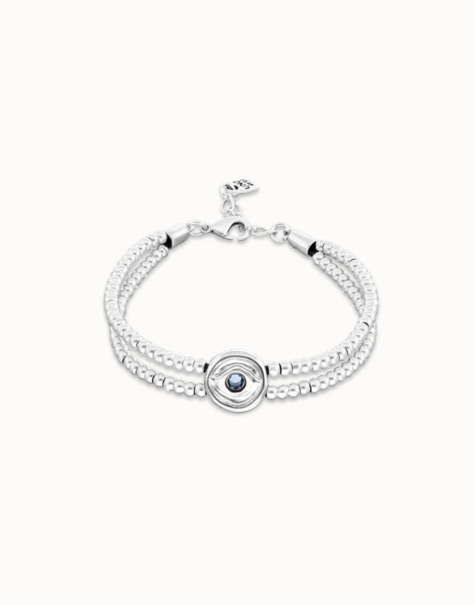 Pulsera de bolas doble bañada en plata de ley con detalle de ojo y cristal azul