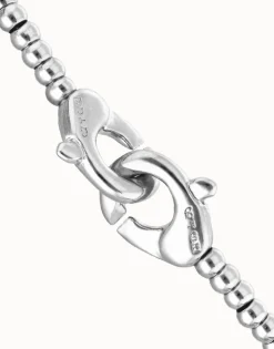 Pulsera de bolas pequeñas bañada en plata con mosquetón entrelazado