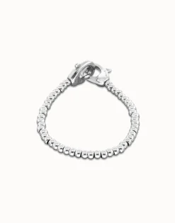 Pulsera de bolas pequeñas bañada en plata con mosquetón entrelazado
