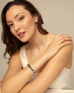 Pulsera de cuero con eslabones bañados en plata de ley