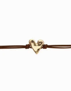 Pulsera de cuero marrón con detalle de corazón bañado en oro 18k