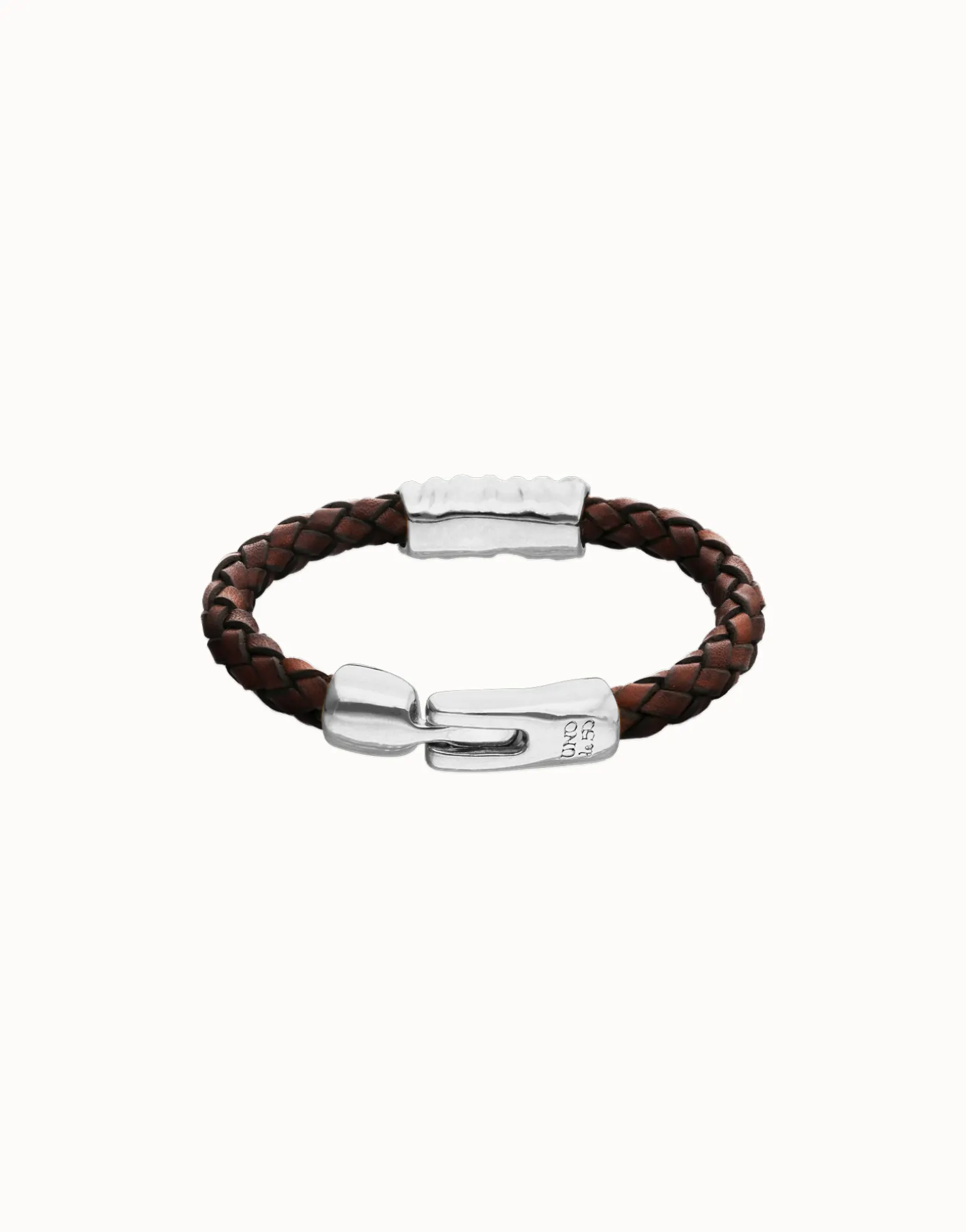 Pulsera de cuero trenzado marrón y detalle bañado en plata de ley