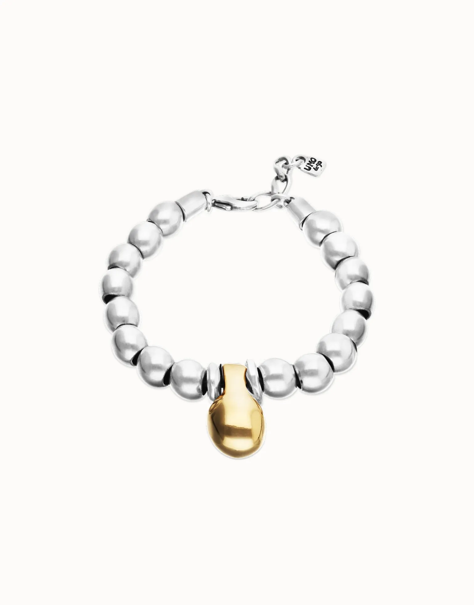 Pulsera de esferas medianas combinando baño en oro y en plata