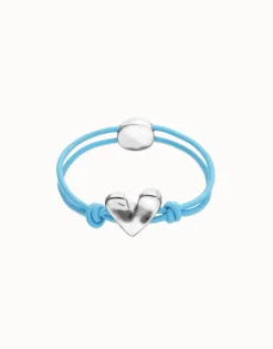 Pulsera de hilo elástico azul con corazón bañado en plata de ley