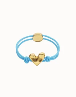 Pulsera de hilo elástico azul con corazón bañado en oro 18k