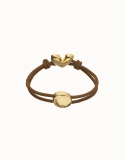 Pulsera de hilo elástico marrón con corazón bañado en oro 18k