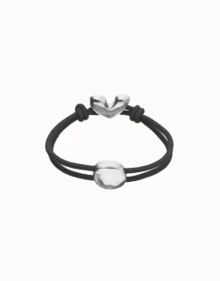 Pulsera de hilo elástico negro con corazón bañado en plata de ley