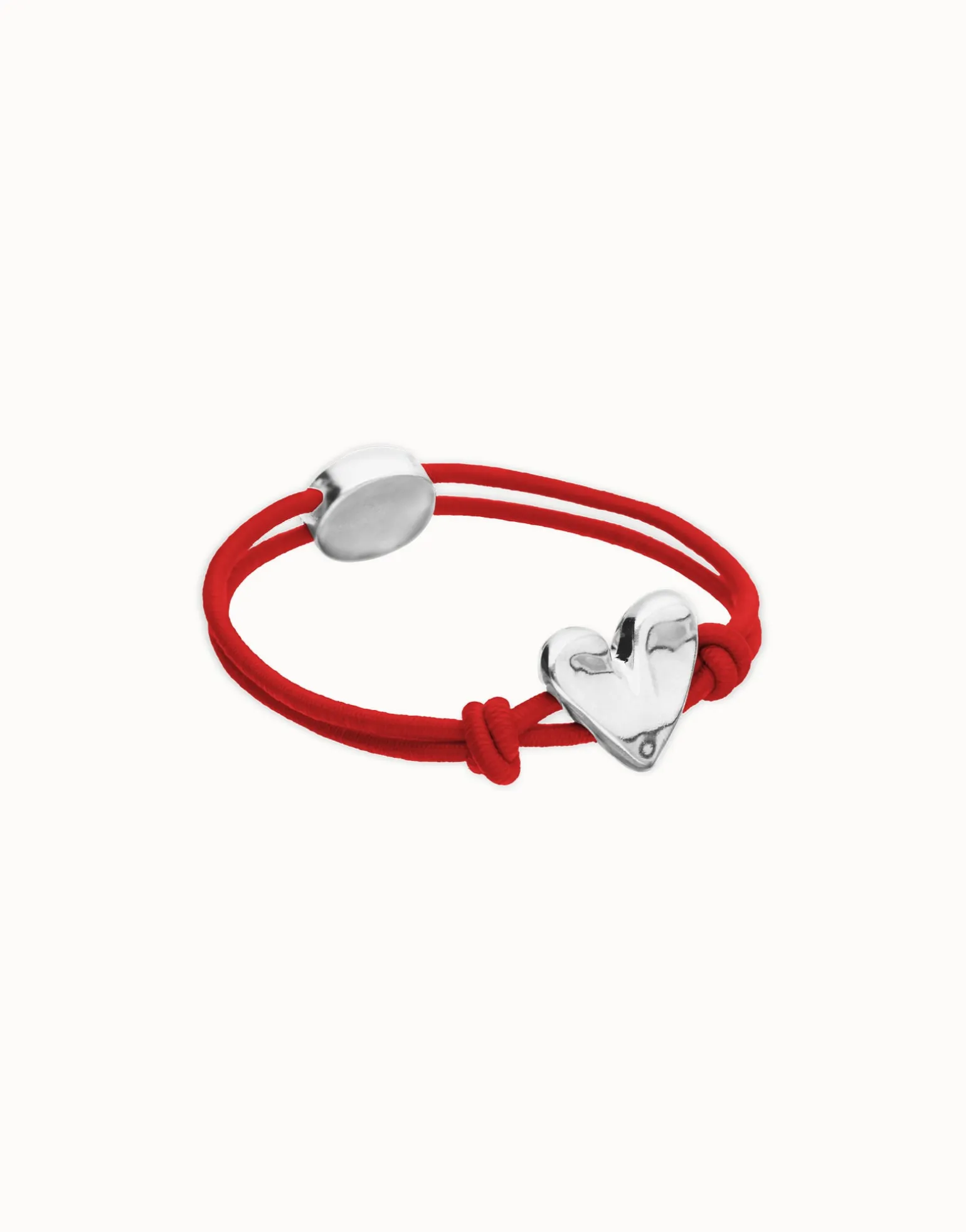 Pulsera de hilo elástico rojo con corazón bañado en plata de ley