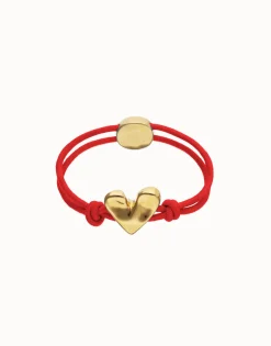 Pulsera de hilo elástico rojo con corazón bañado en oro 18k