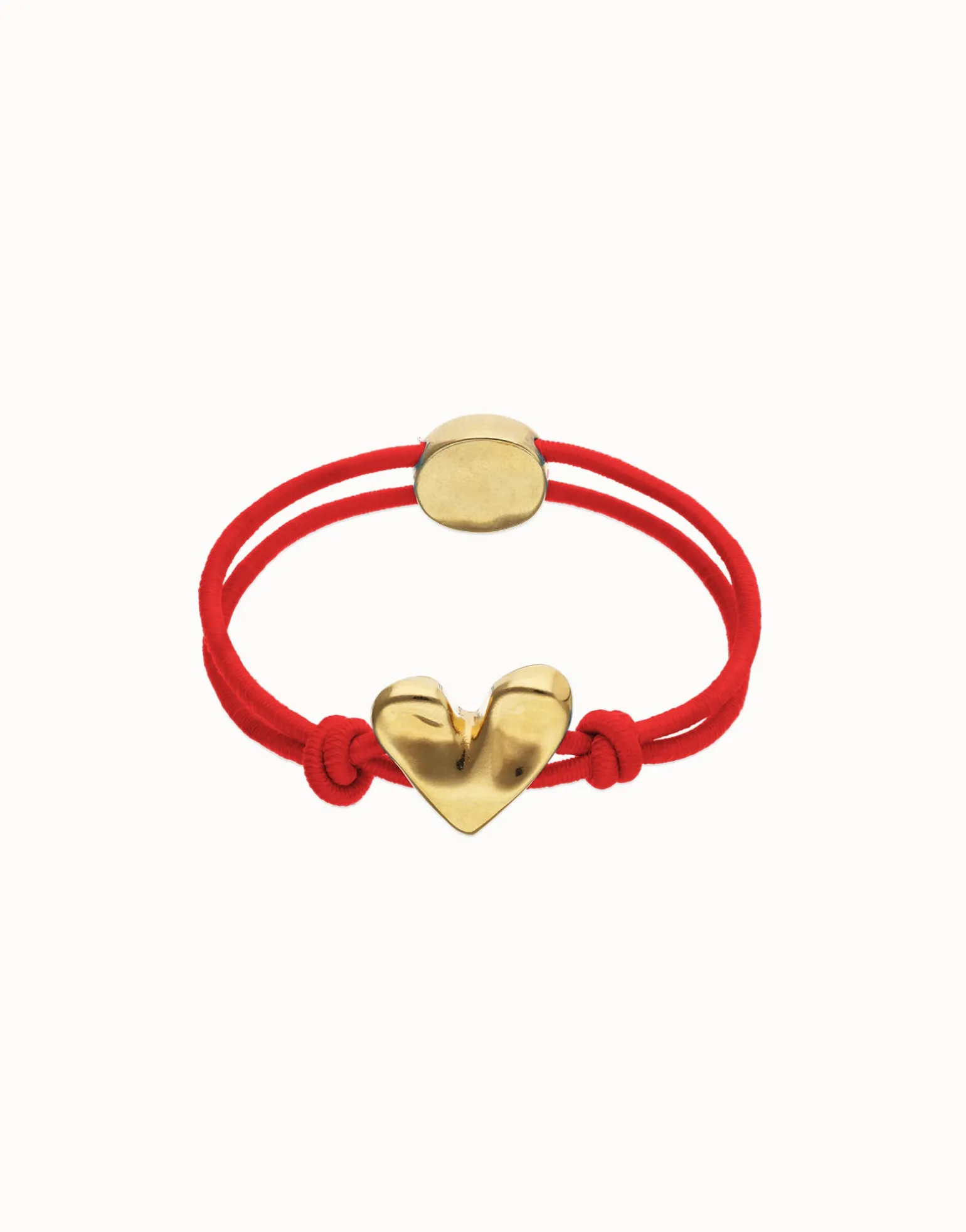 Pulsera de hilo elástico rojo con corazón bañado en oro 18k