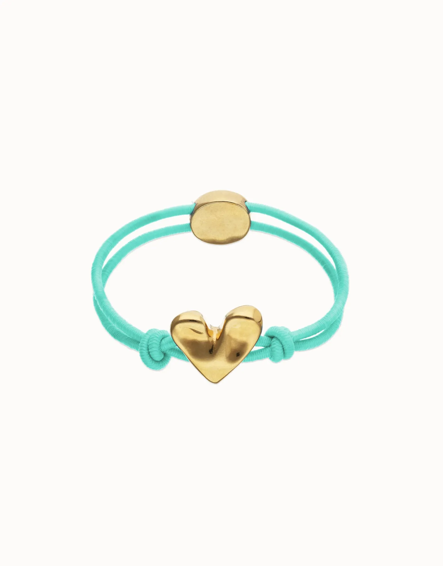Pulsera de hilo elástico turquesa con corazón bañado en oro 18k