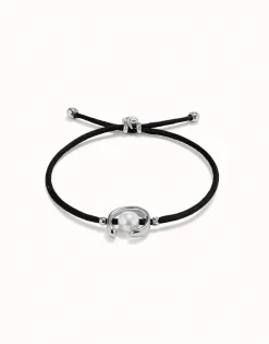 Pulsera de hilo negro con perla shell fornitura bañada en plata de ley.