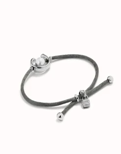 Pulsera de hilo negroso con perla shell fornitura bañada en plata de ley.
