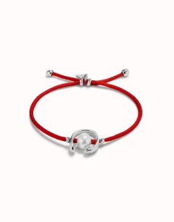 Pulsera de hilo rojo con perla shell fornitura bañada en plata de ley.