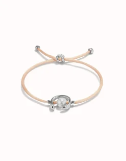 Pulsera de hilo salmón con perla shell fornitura bañada en plata de ley.