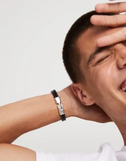 Pulsera doble cuero con 2 circunferencias bañadas en plata de ley